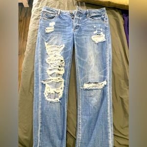 Distressed jeans. AE 12xl Tom girl.